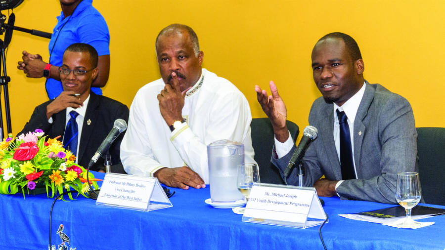 (L-R) Mr Kevin Manning, Vice-Chancellor Professor Sir Hilary Beckles and Mr Michael Joseph as they respond to feedback at the launch of The UWI’s Youth Development Programme (UWI-YDP).