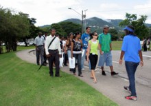 UWI Admissions Student Advocate (ASA) guiding tour participants at the UWI St. Augustine.