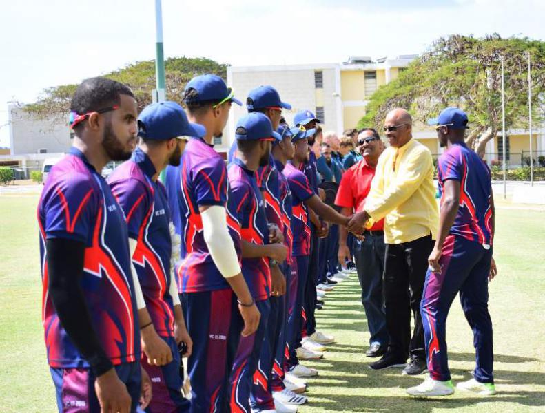 Professor Sir Hilary Beckles greets members of The UWI Vice-Chancellor’s XI team before the match