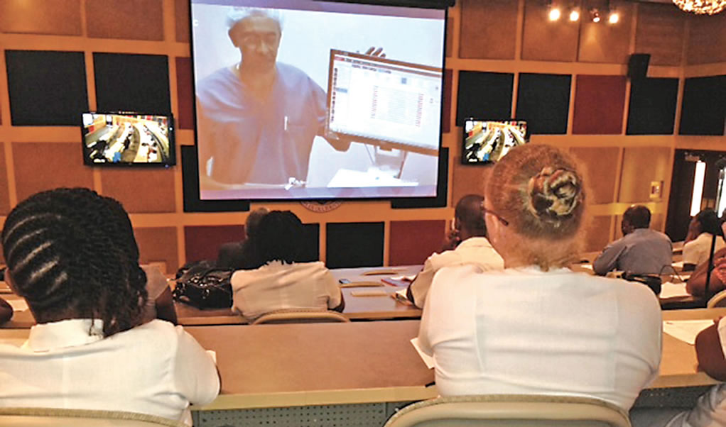 Demonstrating the Skills Lab: Real time demonstrations of minimal access surgery were shared with the Open Campus sites at Cave Hill, (Barbados) and St. Augustine (Trinidad).