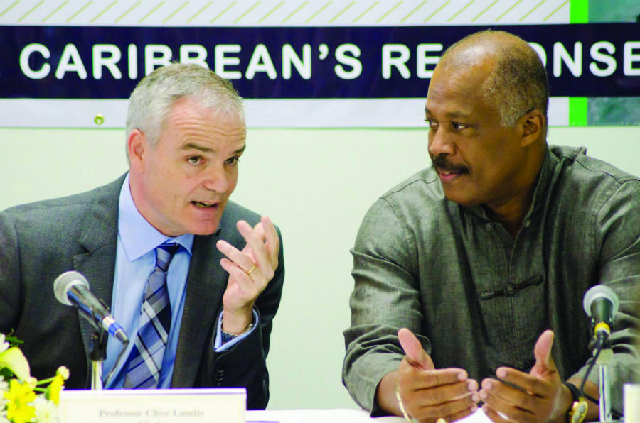 (L-R) Professor Clive Landis Deputy Principal of The UWI Cave Hill and Vice-Chancellor, Professor Sir Hilary Beckles engage the media at a regional Zika press conference held by The UWI in March 2016.