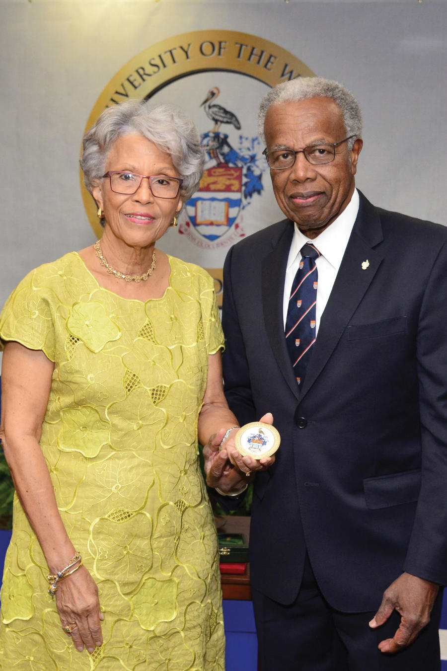 Former UWI Chancellor, Sir George Alleyne presents the Chancellor's Medal to Professor Emerita Elsa Leo-Rhynie at a ceremony at the University's Regional Headquarters on Friday, June 23, 2017.